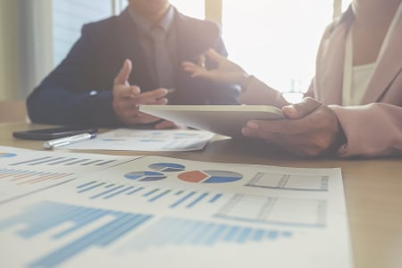 Benchmarking McAdam Siemon Accountanting Businessmen working with charts and graphs Benchmarking McAdam Siemon Accountanting